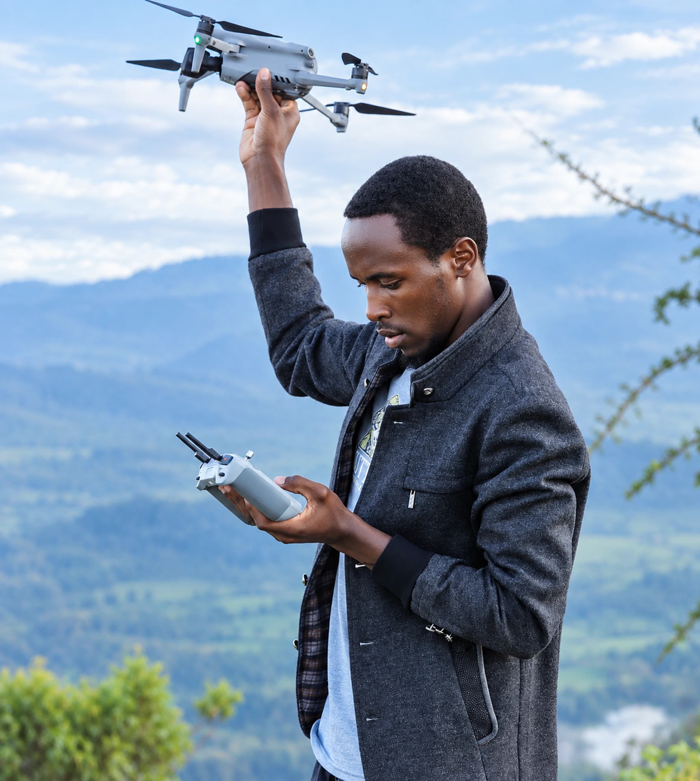 Utana Kinuthia operating a drone in the field
